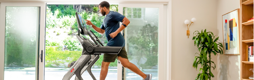 Man running on a bowflex treadmill